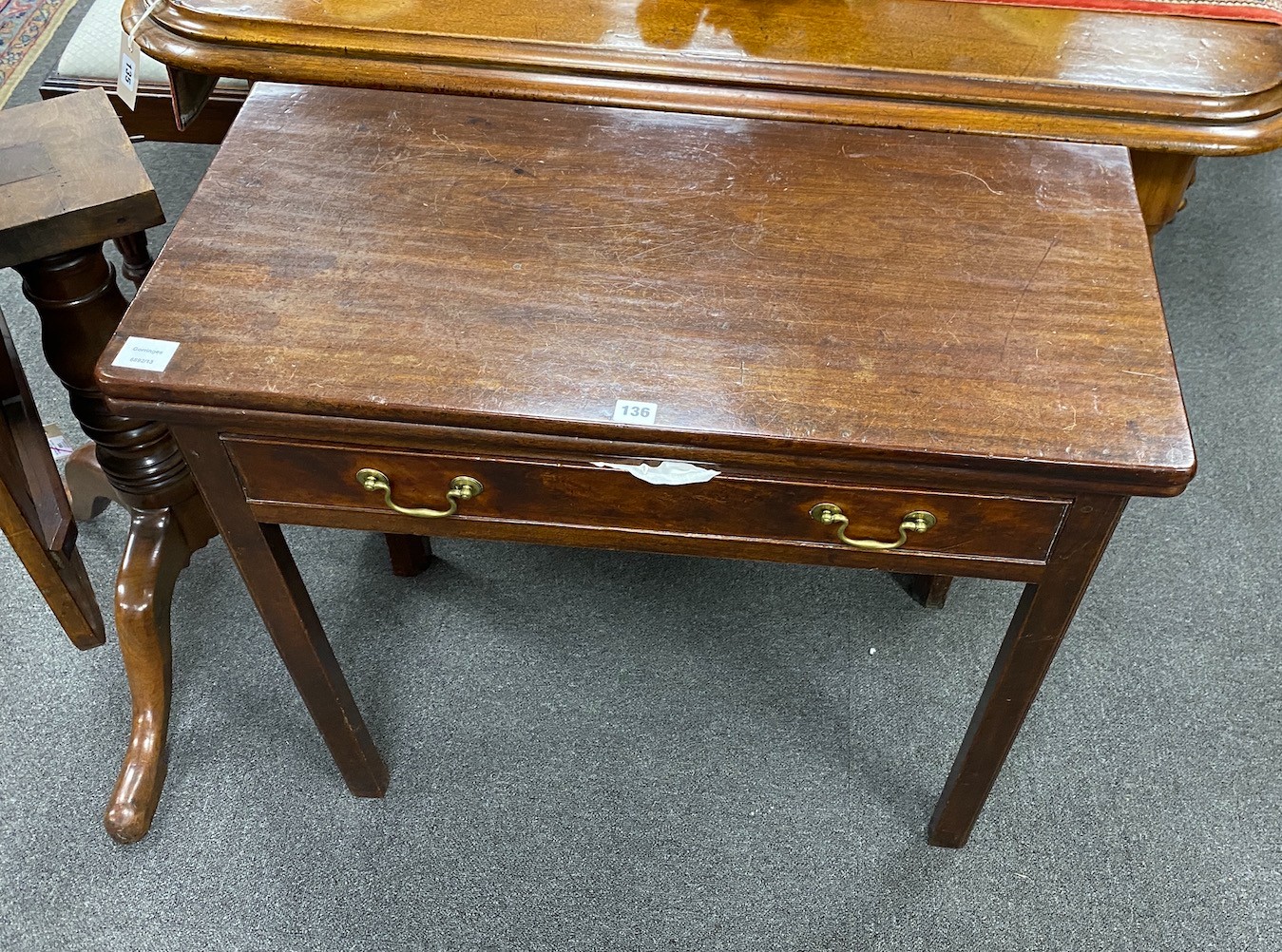 A George III rectangular mahogany folding tea table, width 84cm, depth 40cm, height 74cm
